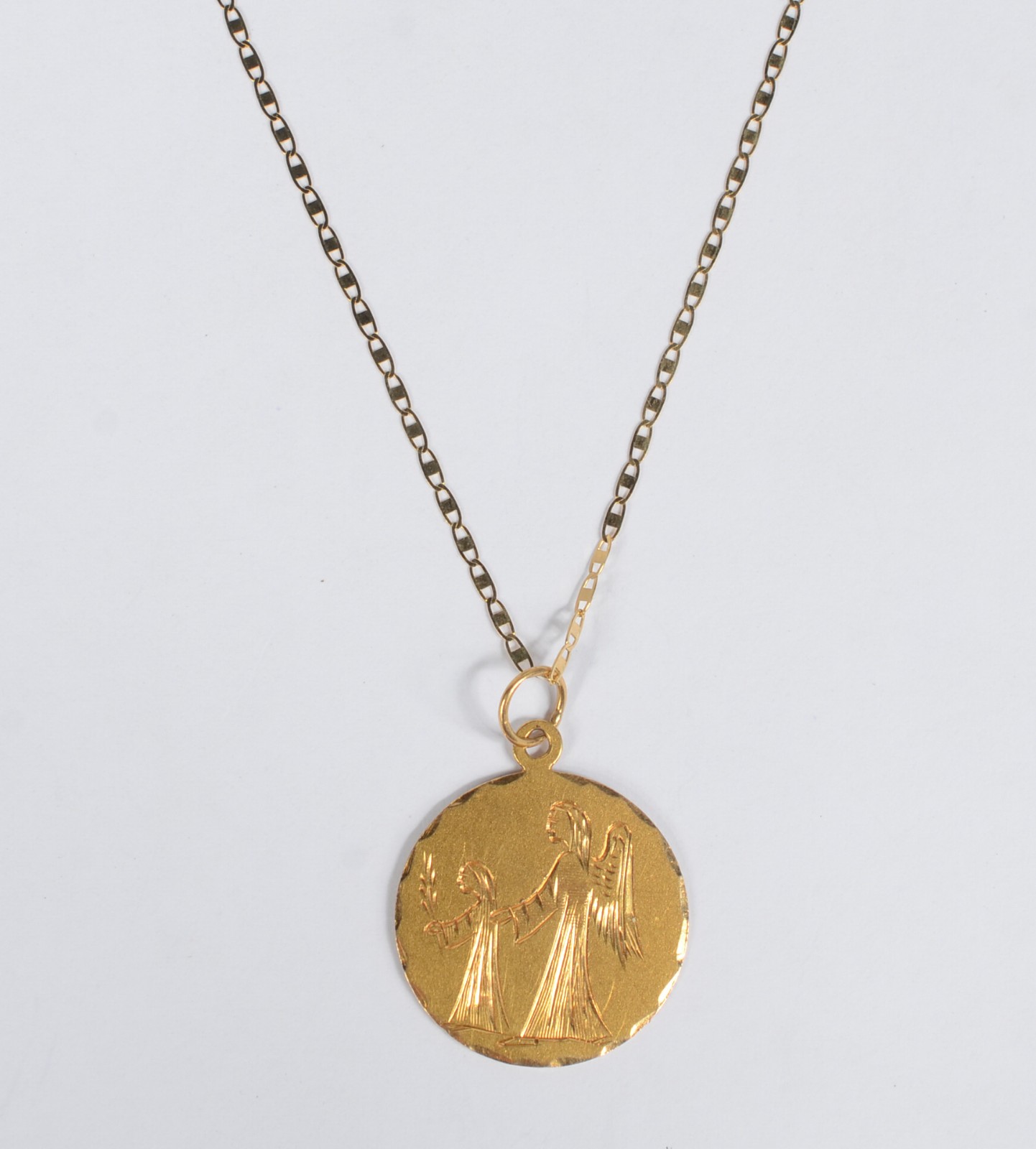 Colar de ouro amarelo 750 com pingente sacro. (Por motivos de... - foto 1 de 6