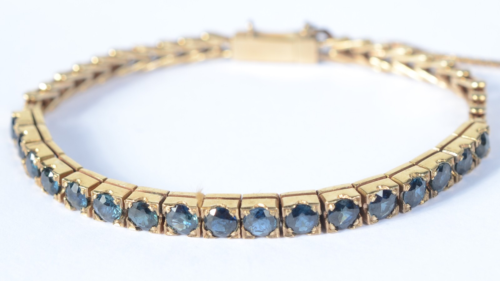 Pulseira "riviera" de ouro baixo com pedras azuis, possivelmente... - foto 1 de 7