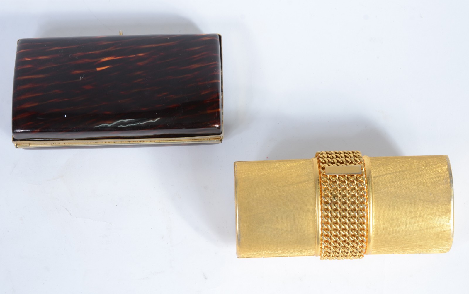 Duas bolsas de mão para toilette, sendo uma italiana de metal dourado... - foto 9 de 10