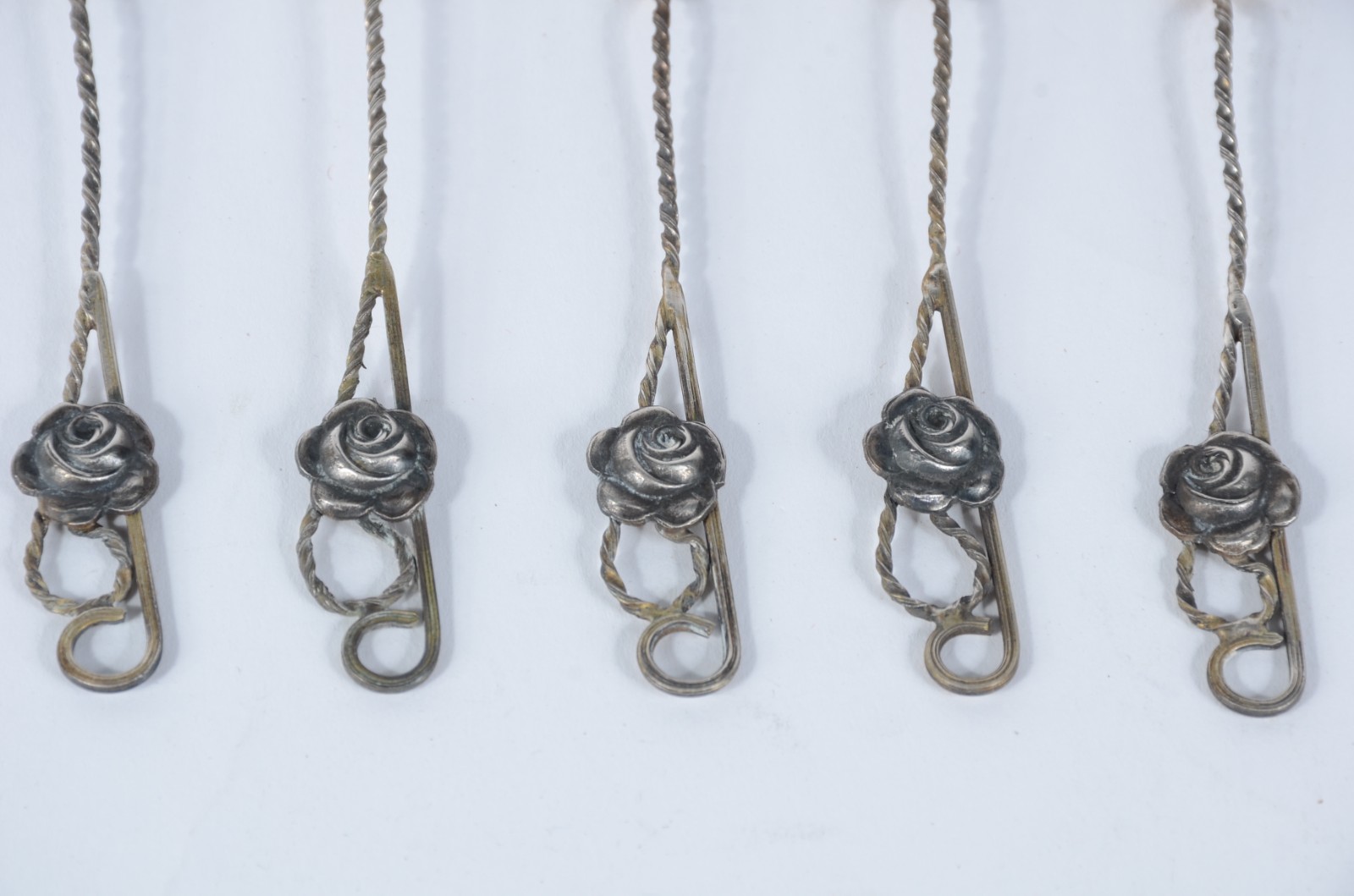 Conjunto com 6 colheres para chá e 1 para açúcar de prata, no estojo - foto 2 de 7