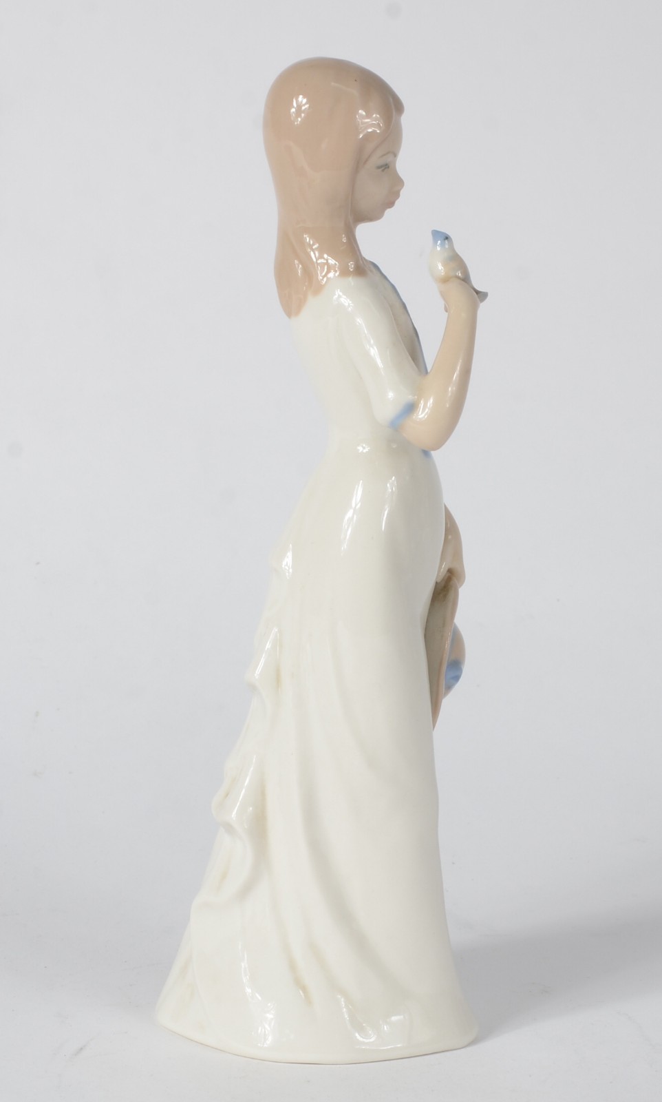 Escultura de porcelana espanhola policromada representando jovem com... - foto 5 de 8