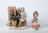 Capodimonte,  - Duas estatuetas de cerâmica policromada representando "menina com lamparina" e "forjador".