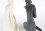HENRIETTE GRANJA,  - Duas figuras femininas de resina na cor preto e branco, assinadas.