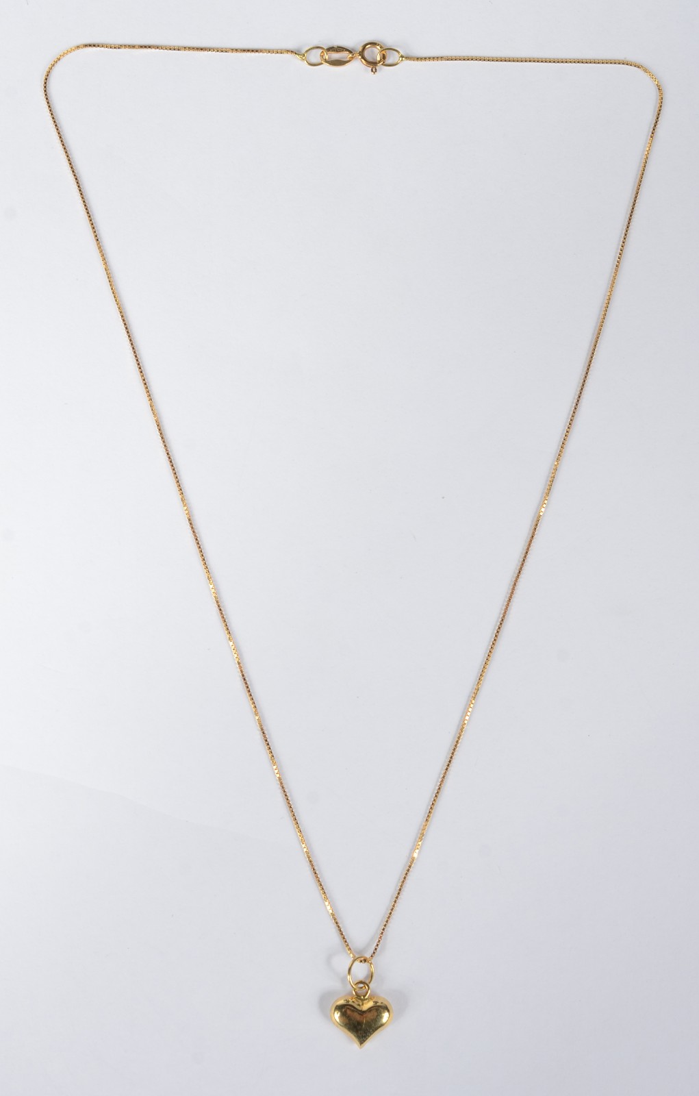 Colar de ouro amarelo com pendente de coração. Peso 1,6g. (Por medida... - foto 2 de 6