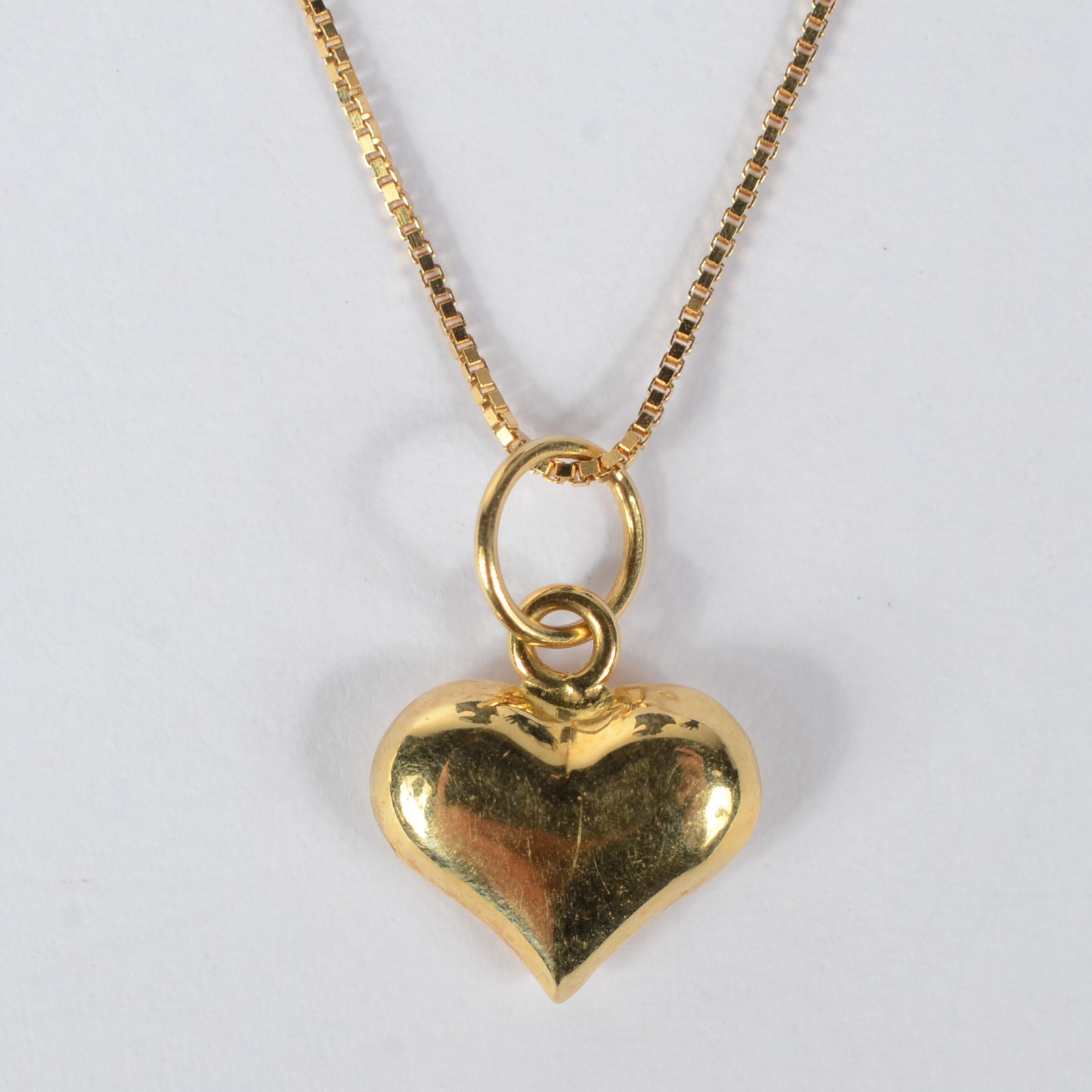 Colar de ouro amarelo com pendente de coração. Peso 1,6g. (Por medida... - foto 3 de 6