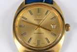 Bucherer - Relógio de metal dourado, pulseira em couro azul, automático. Funcionando.