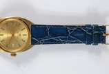 Bucherer - Relógio de metal dourado, pulseira em couro azul, automático. Funcionando.