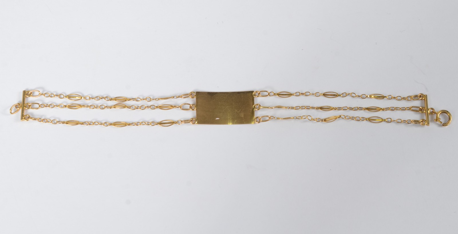 Pulseira de ouro 18 k com placa para gravar o nome. - foto 5 de 5