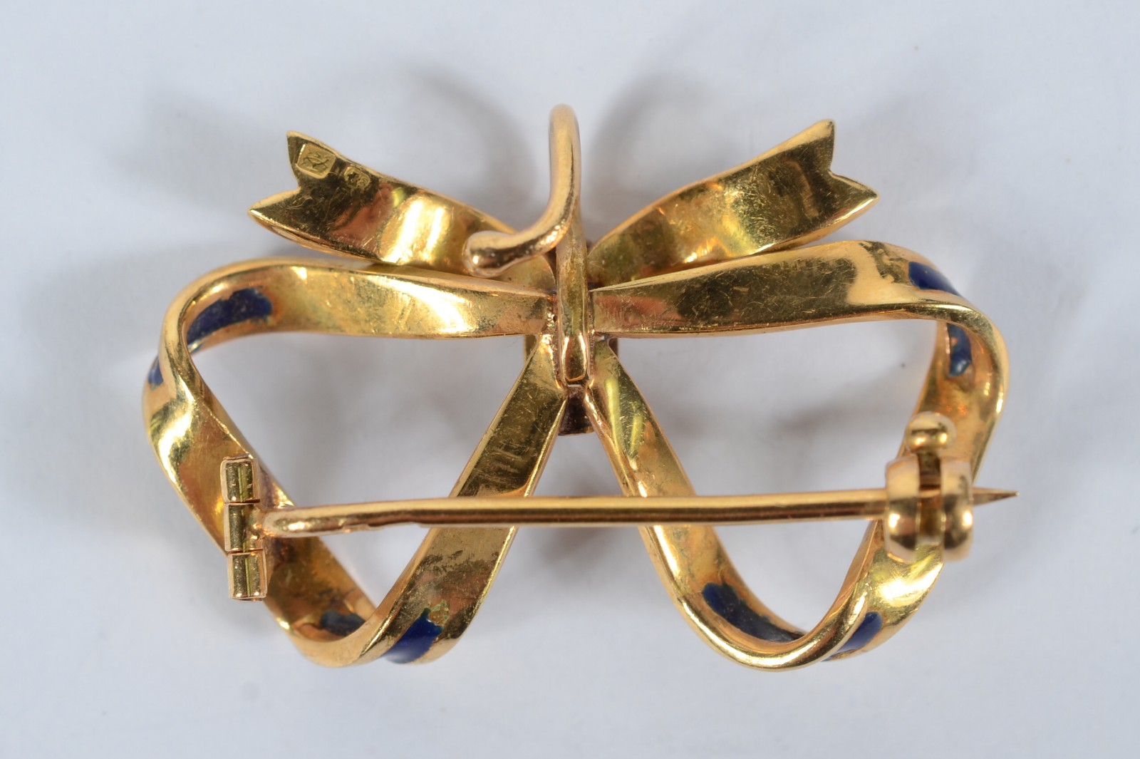 Broche de ouro 18 k na forma de laço - foto 3 de 4