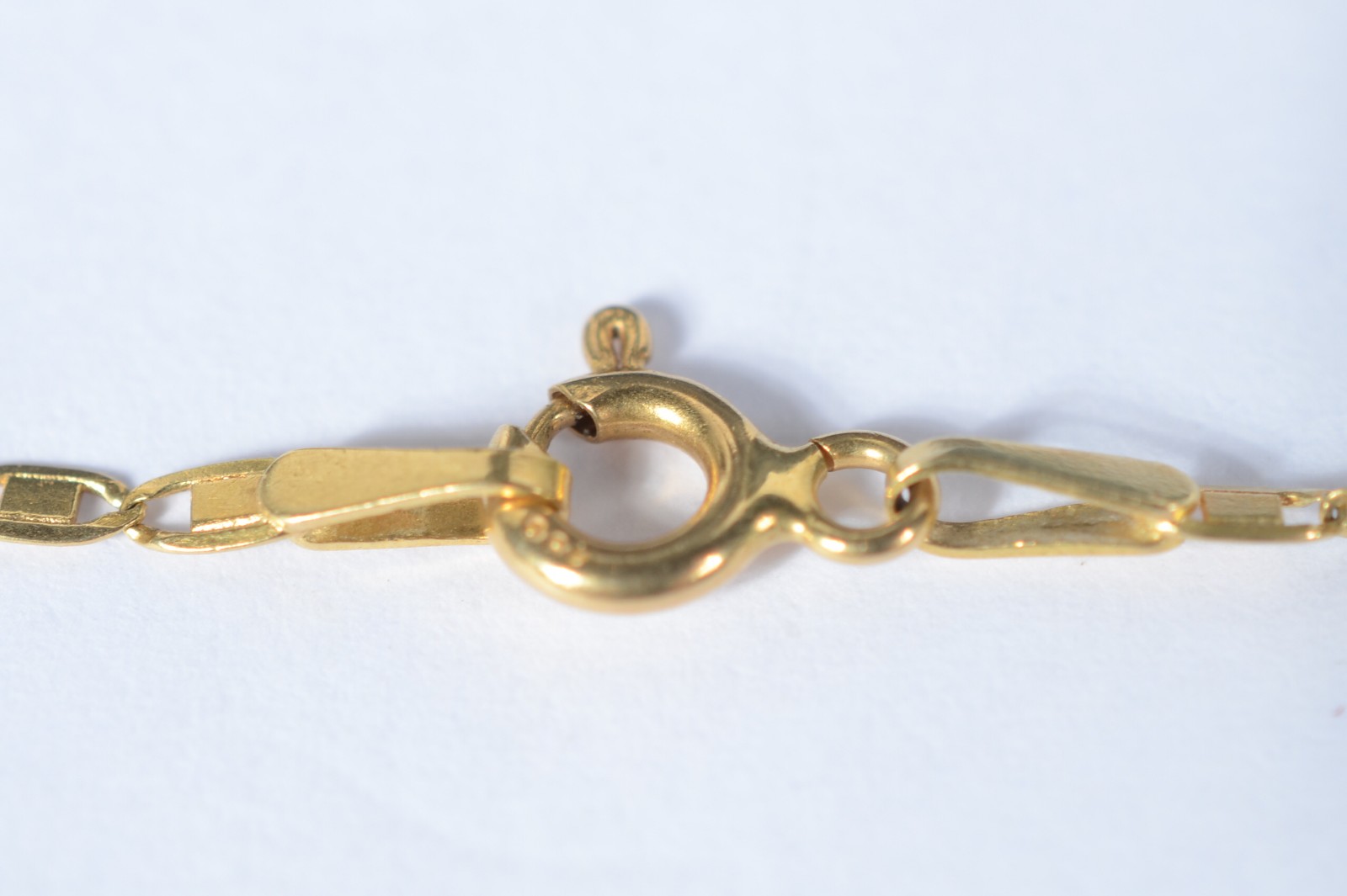 Cordão de ouro amarelo 750, modelo com pingente no feitio de cruz... - foto 7 de 7