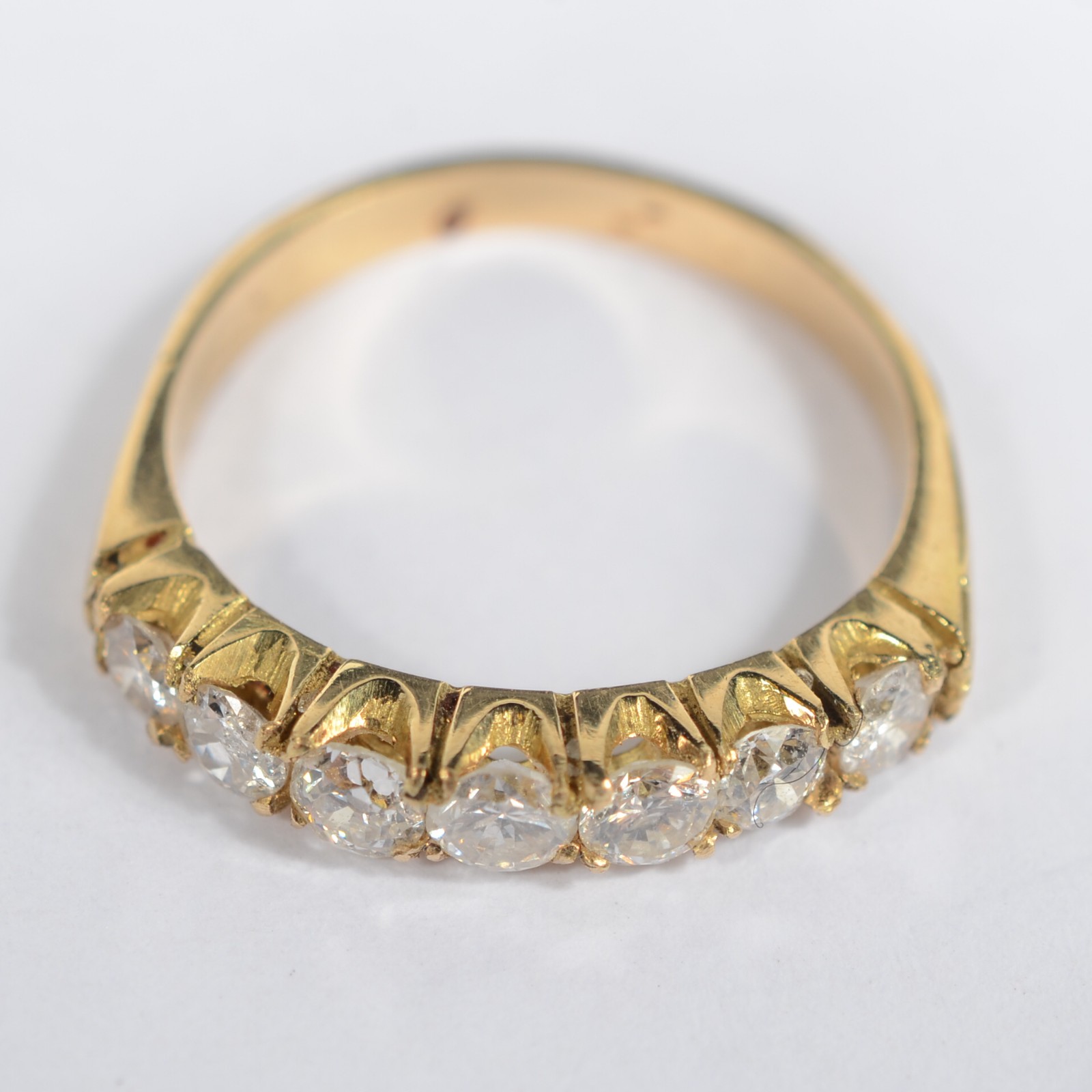 Anel de ouro amarelo 750 com 7 brilhantes de 0,10 cts total 0,70cts... - foto 2 de 6