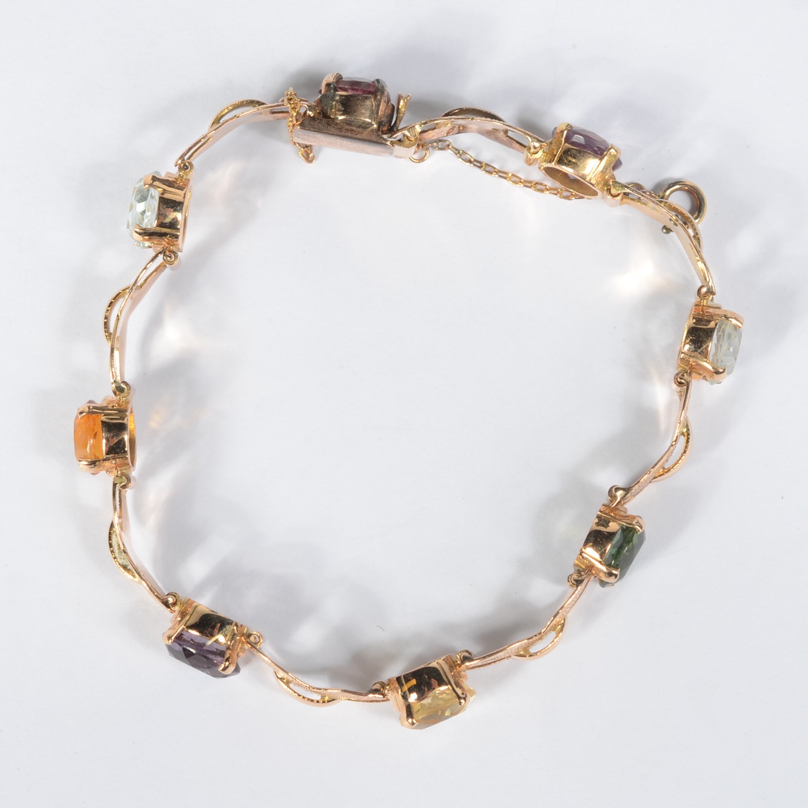 Pulseira antiga de ouro amarelo 18k cravejada com pedras coloridas... - foto 1 de 6