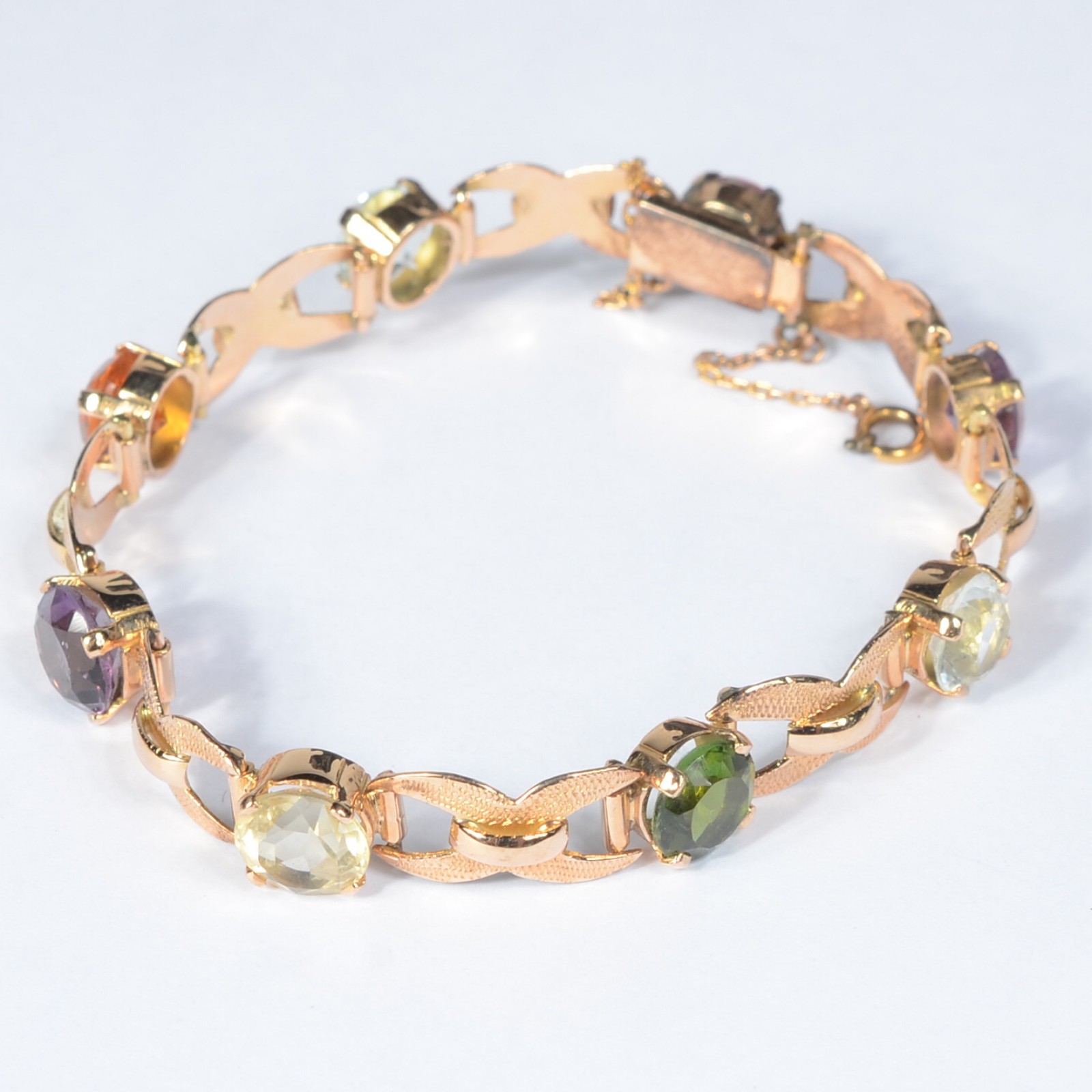 Pulseira antiga de ouro amarelo 18k cravejada com pedras coloridas... - foto 2 de 6