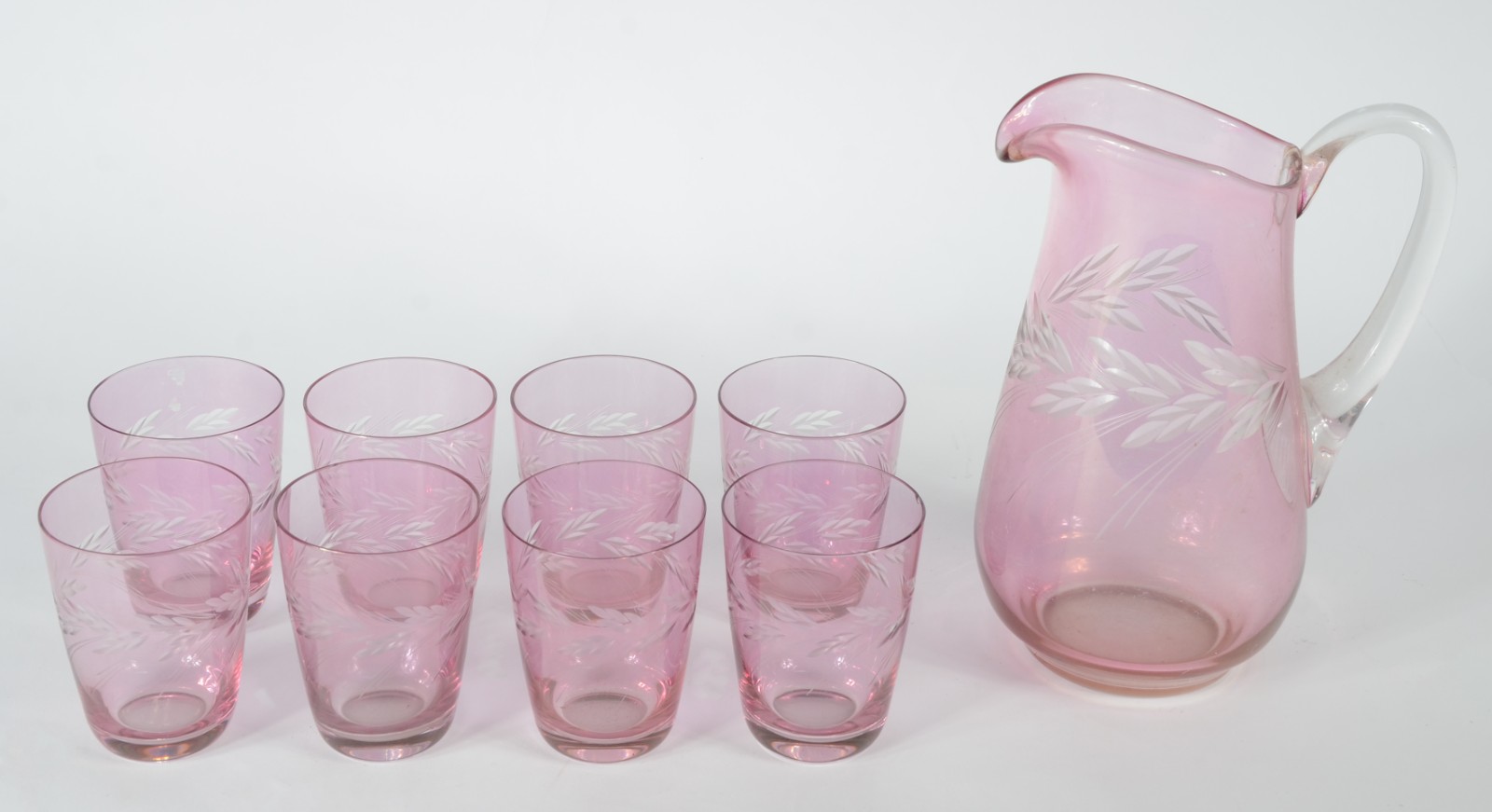 Conjunto para refresco de cristal rosa lapidado composto de jarra e 8... - foto 1 de 5