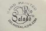 Cerámica Del Río Salado (1969),  - Prato raso de cerâmica espanhola decorado com limões sicilianos em policromia sobre fundo floral.