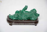 Escultura de malaquita representando figura ori... - Escultura de malaquita representando figura oriental. Altura 7,5 cm.