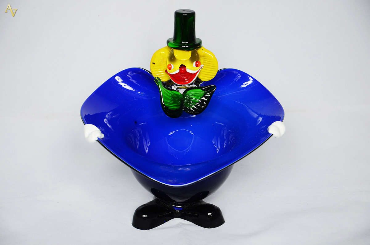 Baleiro na forma de palhaço de murano azul. Altura 23 cm.