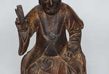 Escultura de madeira representando Buda. Altura... - Escultura de madeira representando Buda. Altura 49 cm.