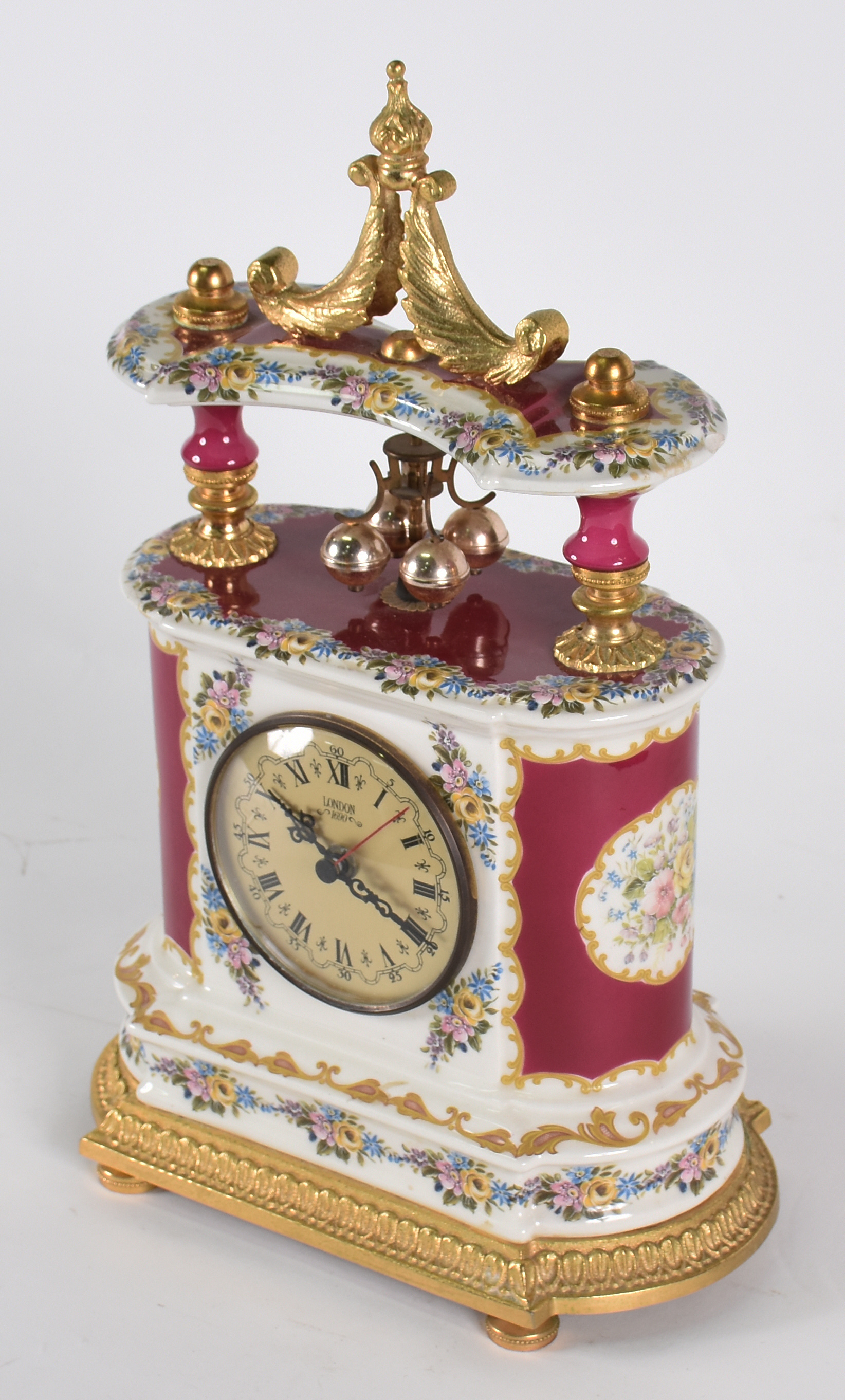 Relógio decorativo de mesa em porcelana policromada com realces... - foto 2 de 4