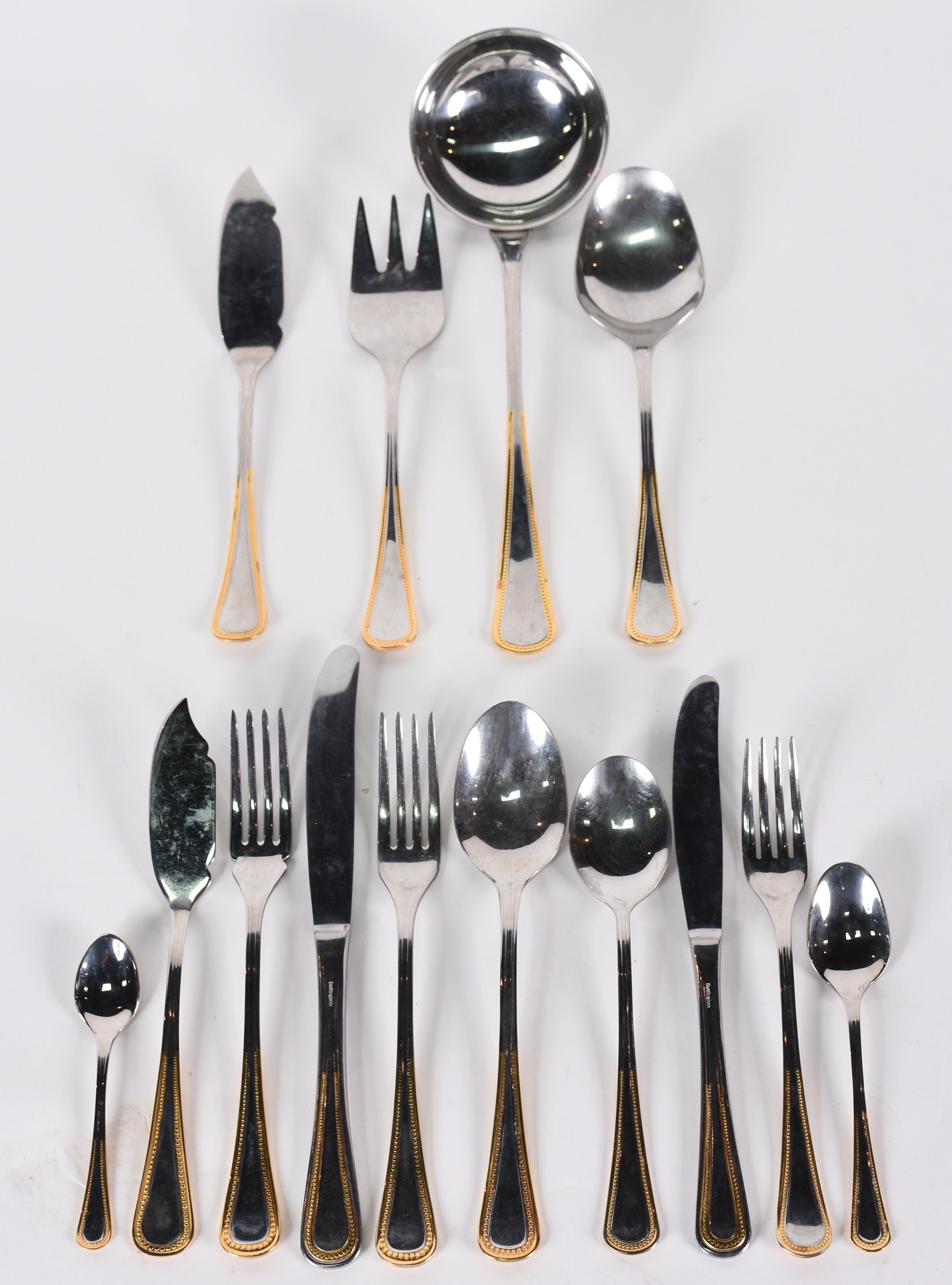 Faqueiro de aço inox GOTTINGHEN 18/10 com detalhes em dourado... - foto 1 de 2