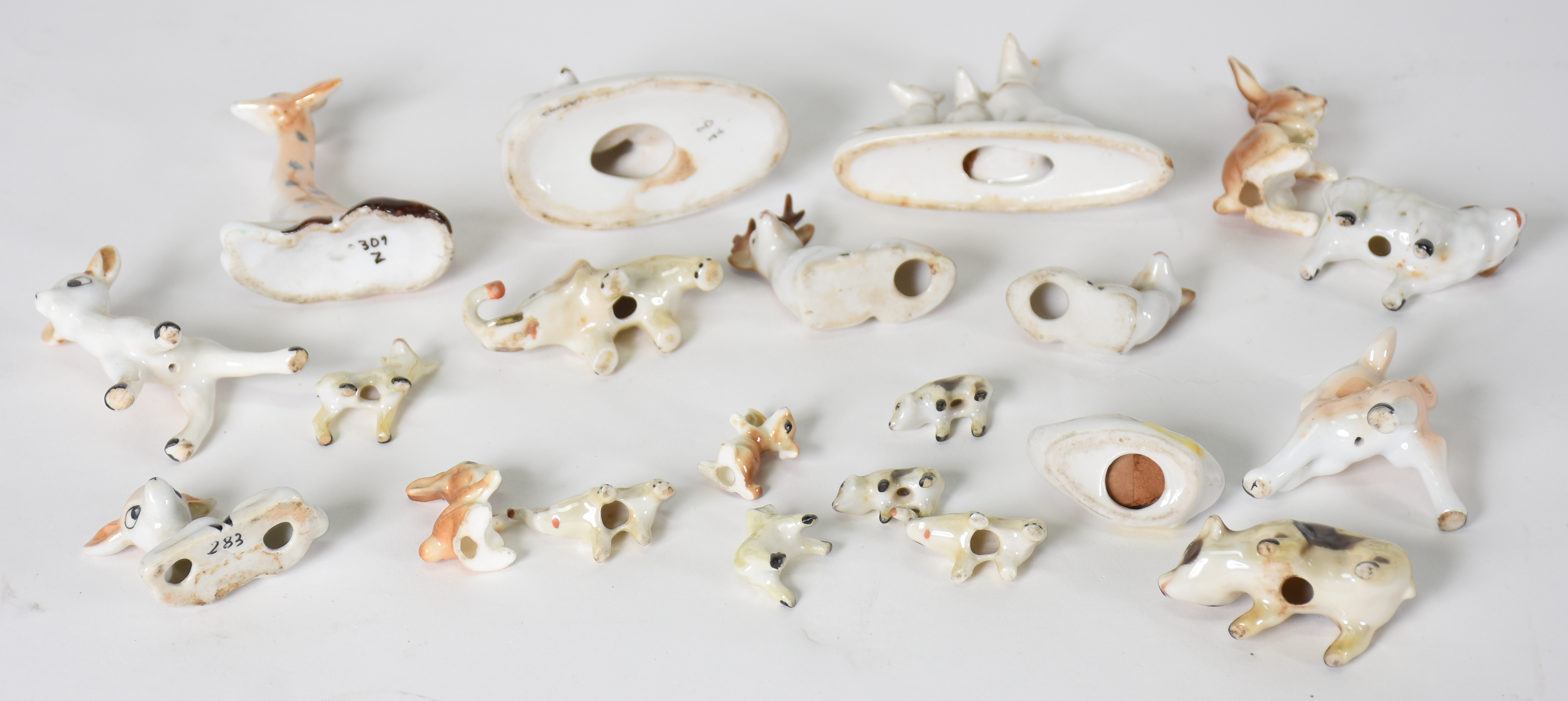 Conjunto com 21 miniaturas de porcelana - foto 3 de 3