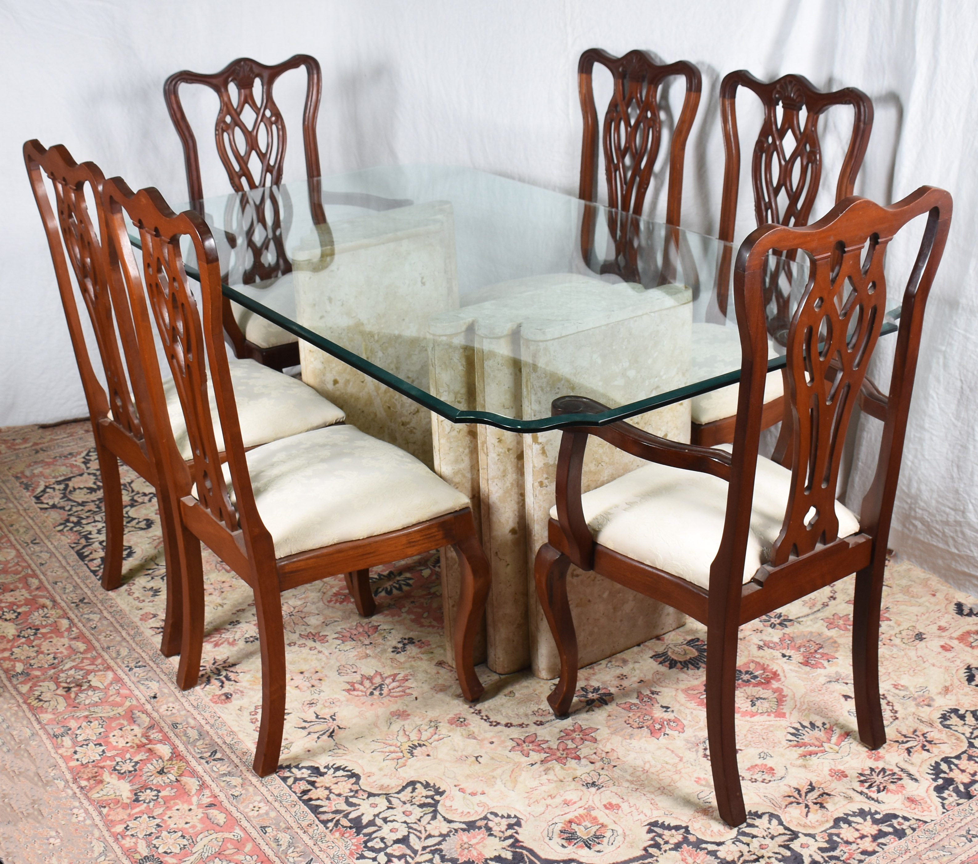 Mesa de jantar com tampo de cristal e base em duas colunas de... - foto 1 de 3