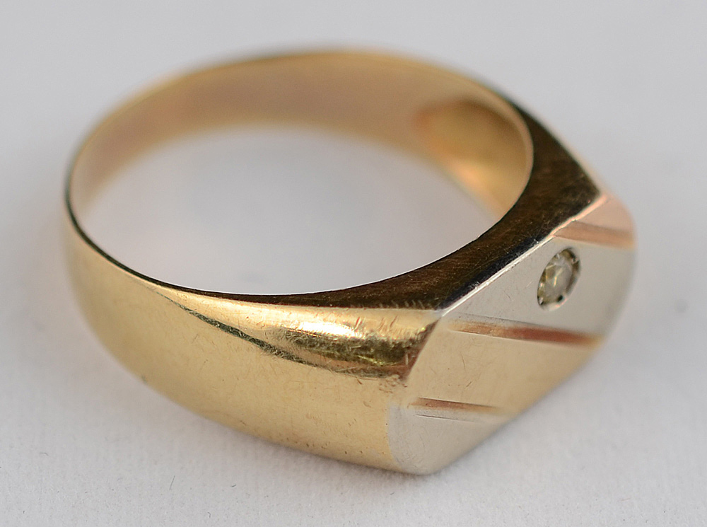 Anel em ouro amarelo 18 k e ouro branco com brilhante. Peso total 8,3... - foto 1 de 2