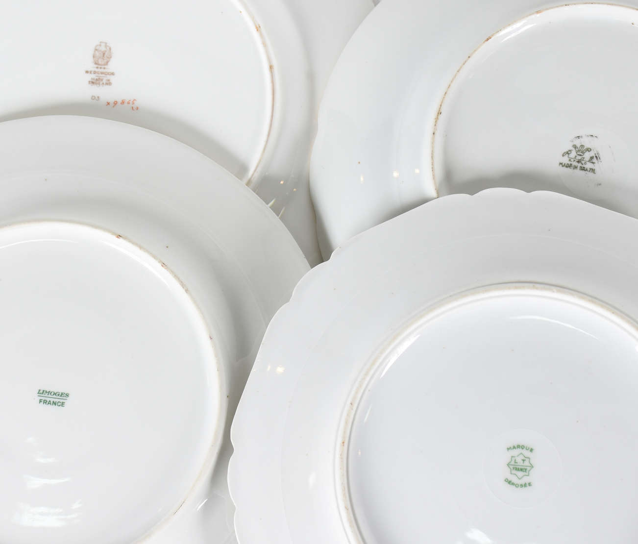 Dez pratos de porcelana de diversas procedências - foto 4 de 4