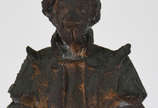 Escultura de bronze representando figura mascul... - Escultura de bronze representando figura masculina. Base com inscrição "Prêmio Estacio de Sá, 1967" - Museu da Imagem e do Som.