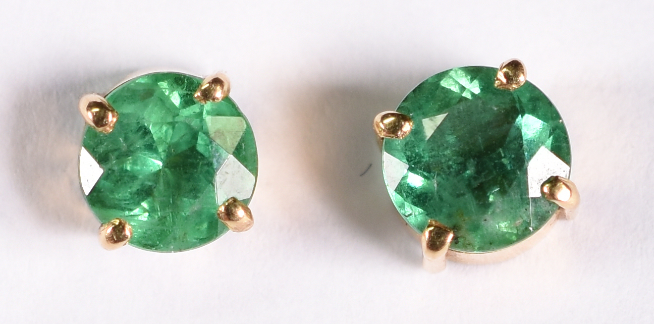 Par de brincos de ouro amarelo com 2 pedras verde ( Por questão de... - foto 1 de 2
