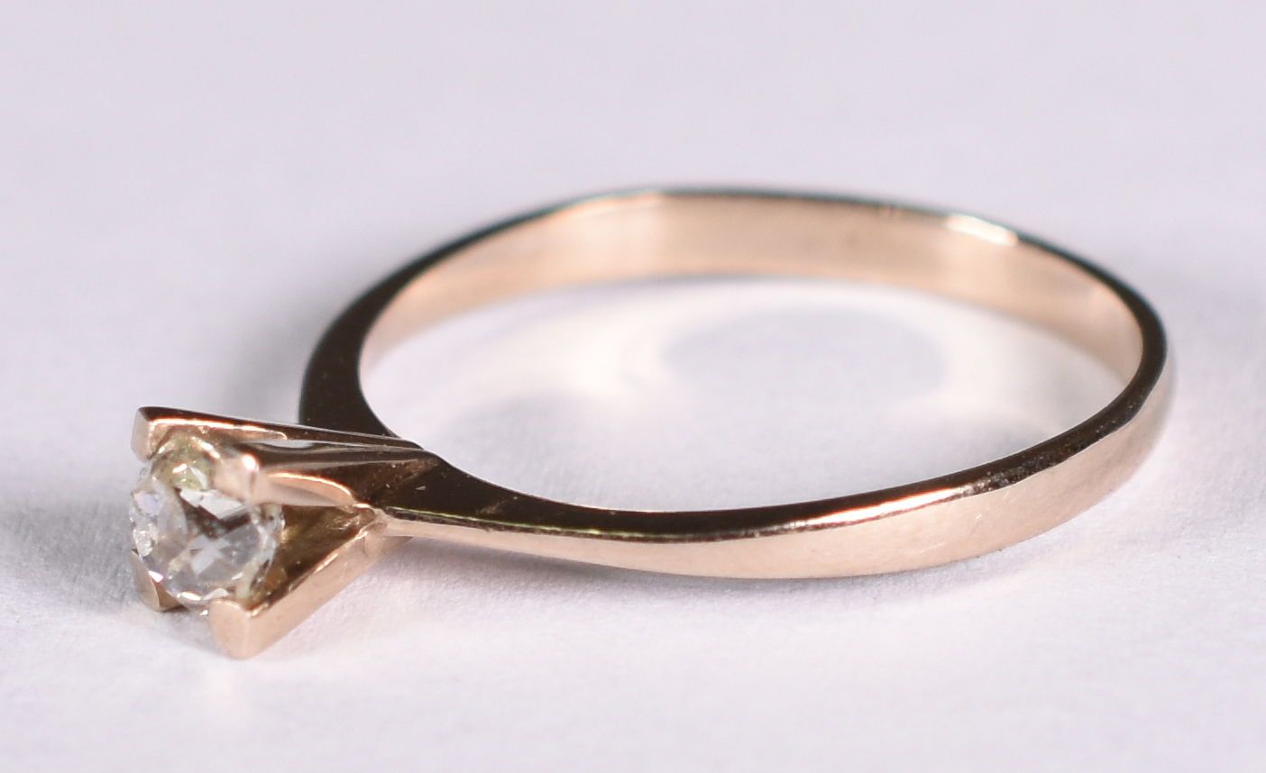 Solitário de ouro branco com 1 brilhante de 0,25 ct . aro 18 ( Por... - foto 2 de 3