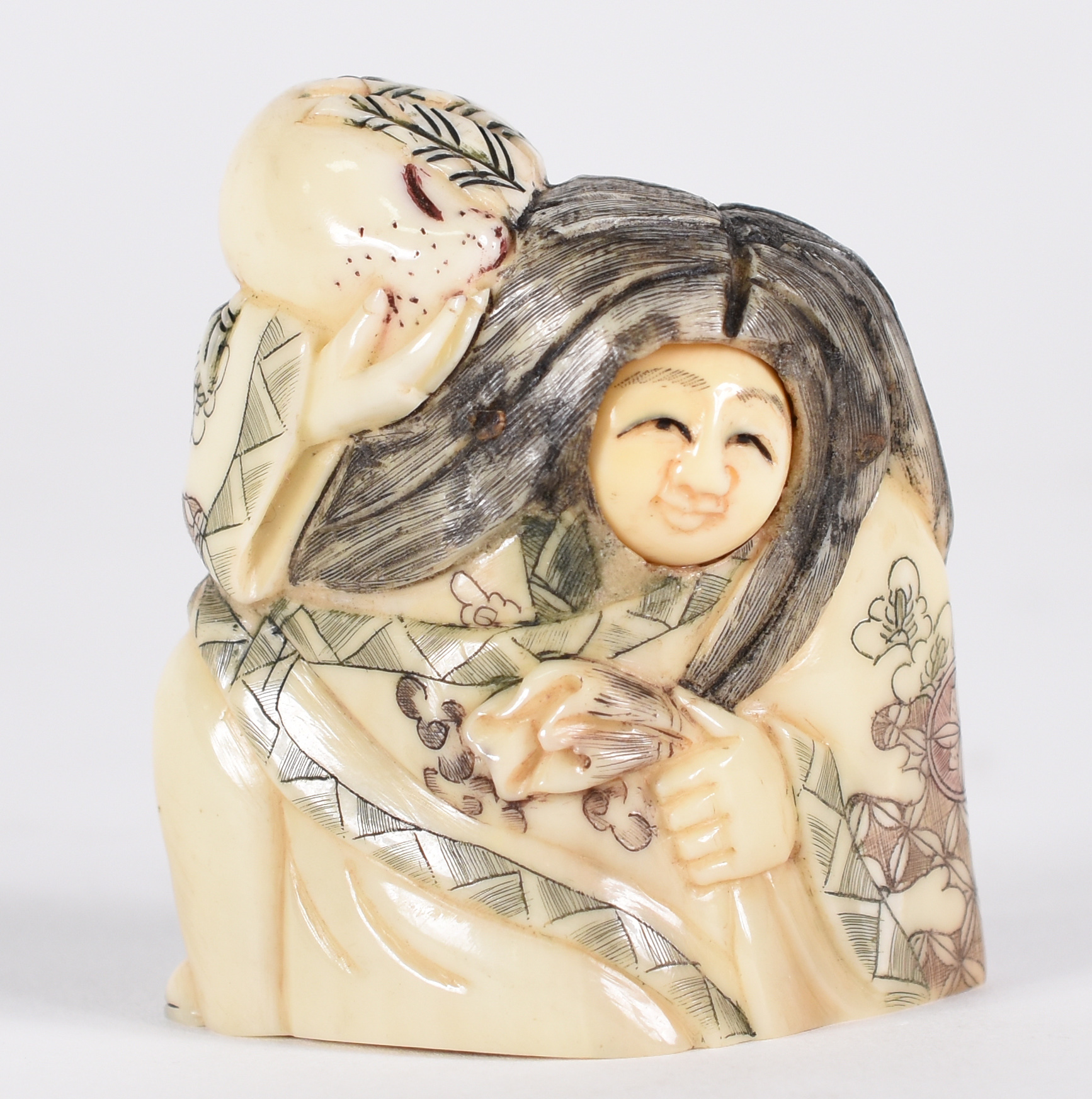 Netsuke de marfim , personagem teatro Kabuki, rosto móvel , assinado. - foto 1 de 4