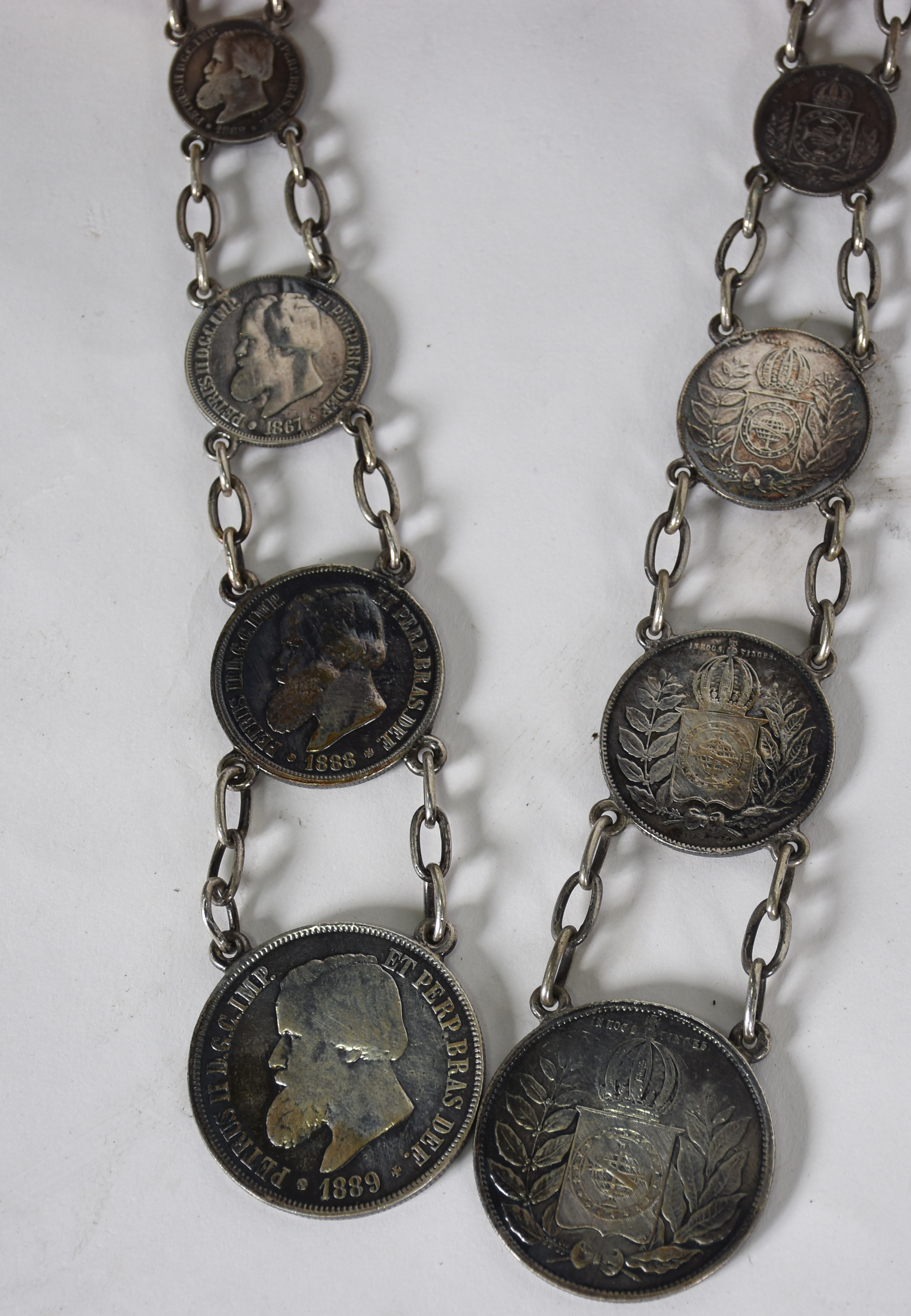 Quatro peças de prata de lei, sendo: par de cinzeiros com moedas para... - foto 5 de 5