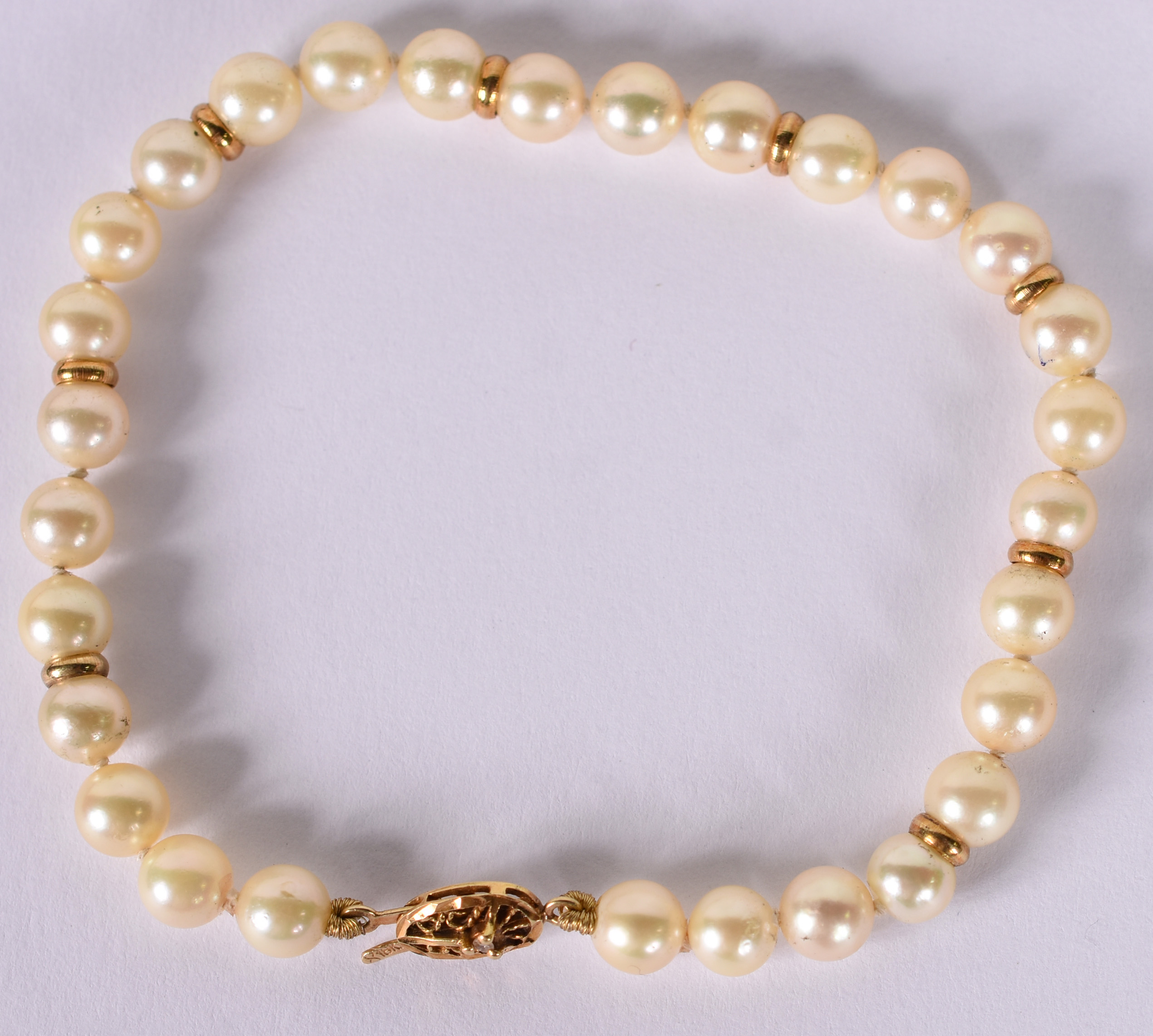 Pulseira de pérolas cultivadas com fecho e espaçadores de ouro .( Por... - foto 2 de 2