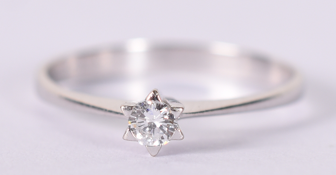 Solitário de ouro branco com 1 brilhante de 0,5 ct. Aro 16 ( Por... - foto 1 de 4
