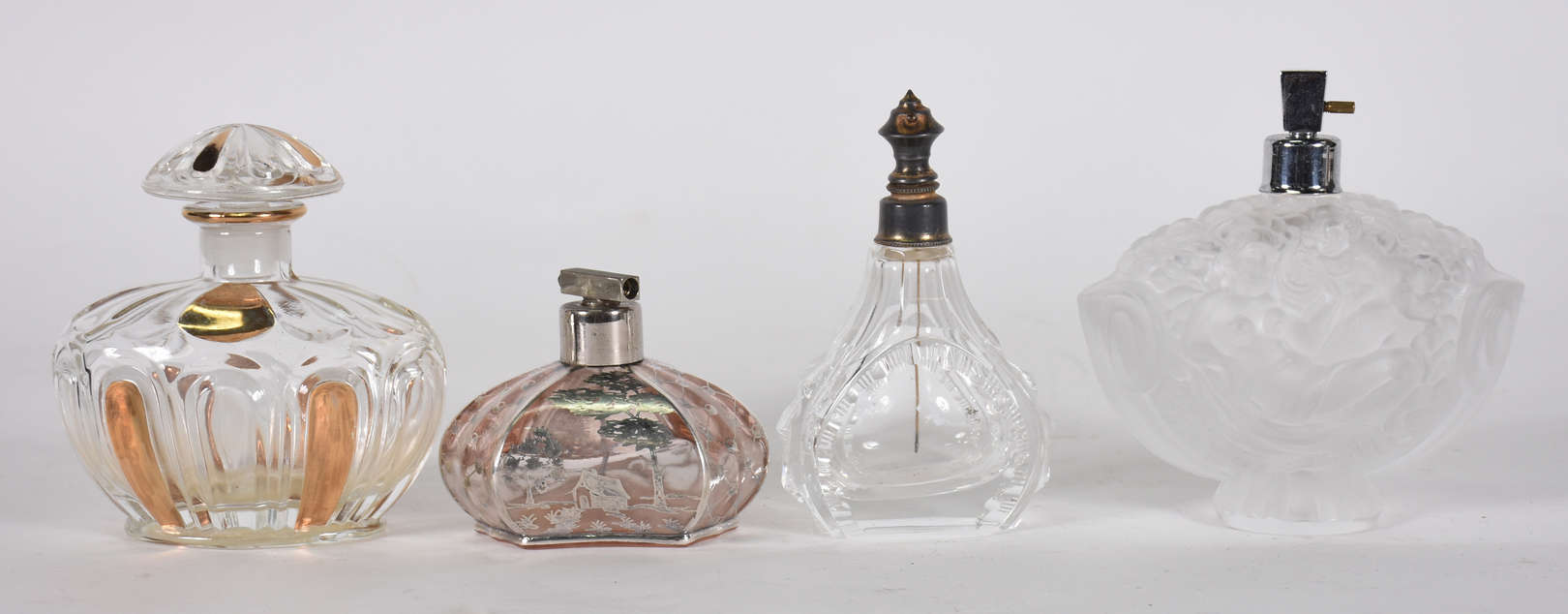 Quatro perfumeiros diversos de vidro e cristal - foto 1 de 3