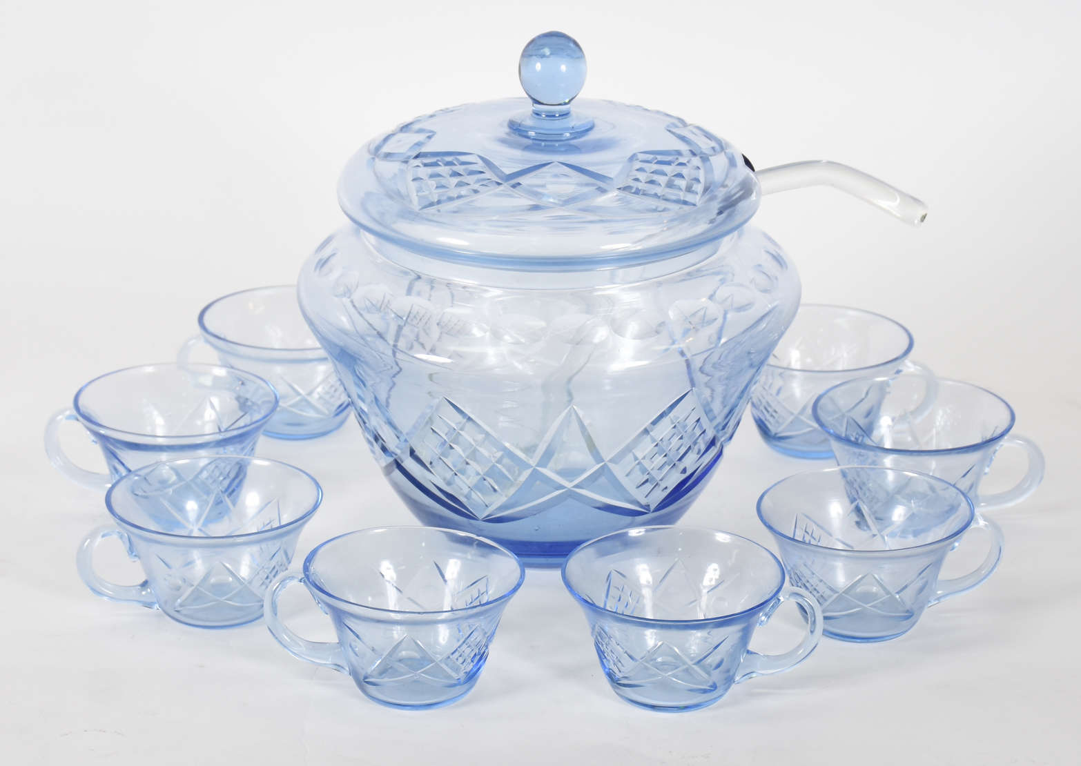 Poncheira em demi cristal lapidado na cor azul com 8 taças e concha. - foto 1 de 4