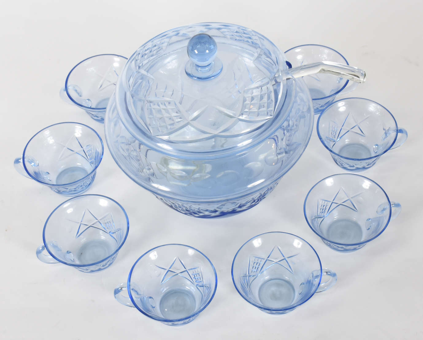 Poncheira em demi cristal lapidado na cor azul com 8 taças e concha. - foto 2 de 4