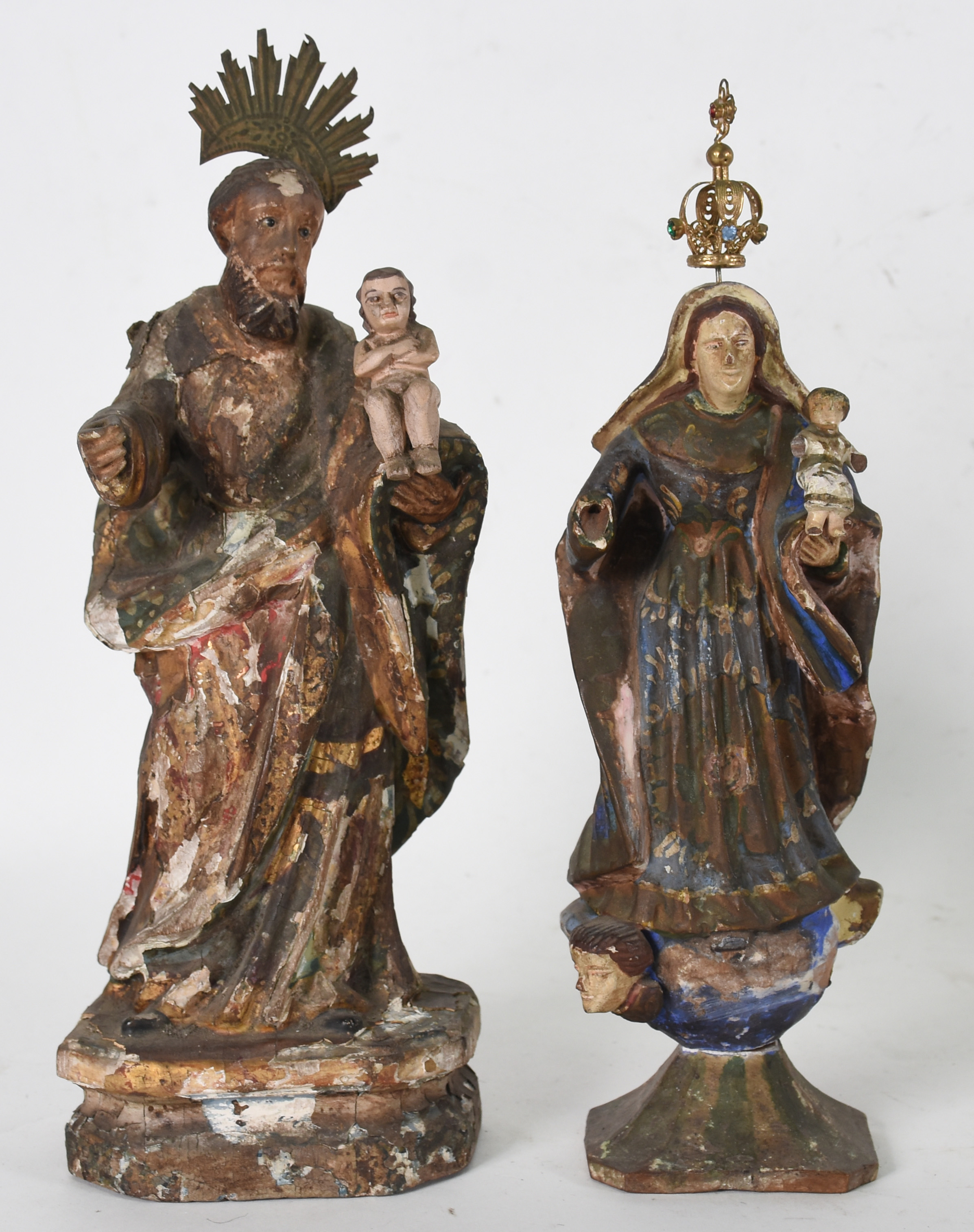 Duas imagens de madeira representando São José e n. Senhora. - foto 1 de 3