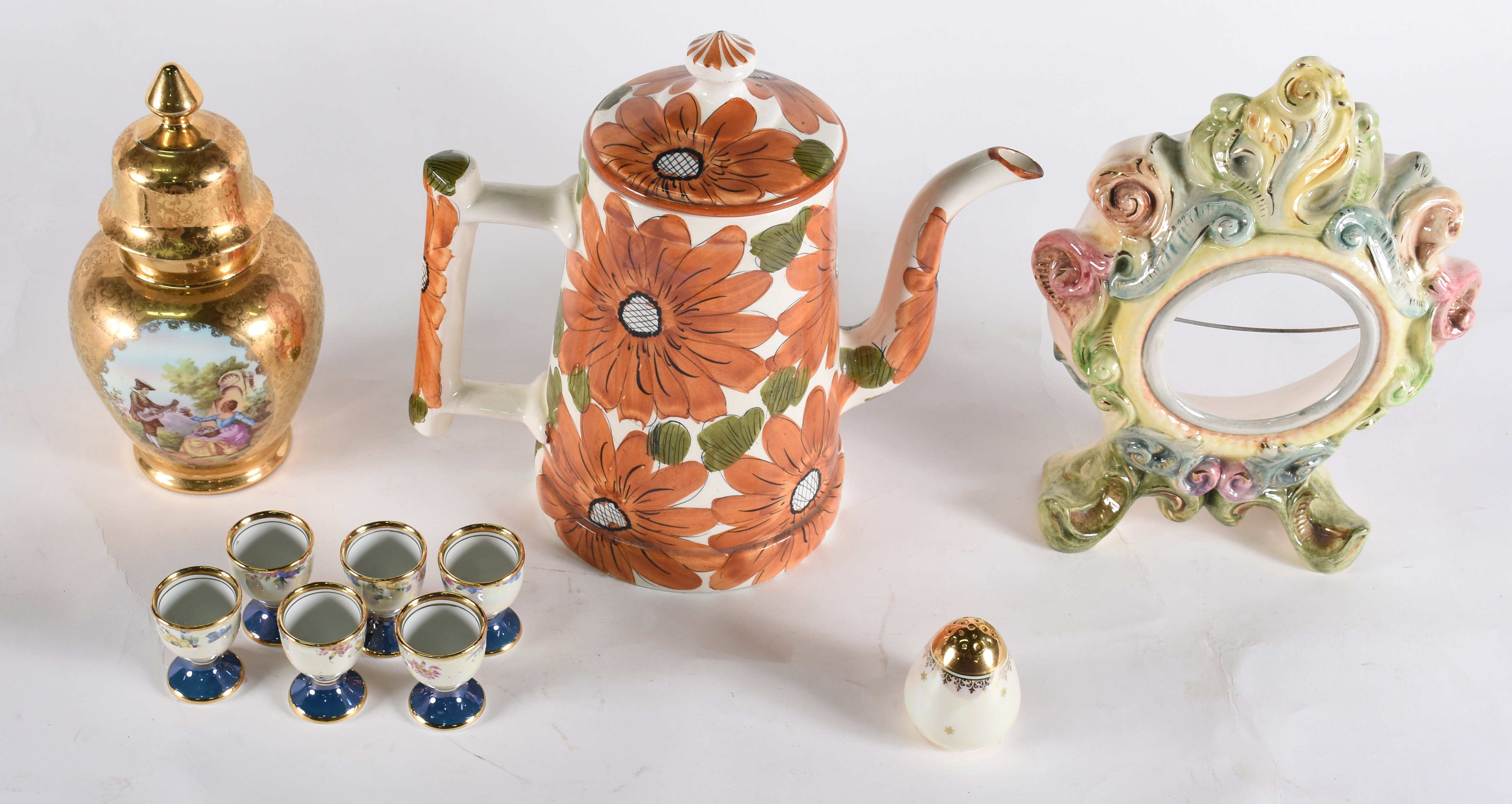 Diversas peças de porcelana sendo, potiche, saleiro, 6 copinhos... - foto 2 de 8