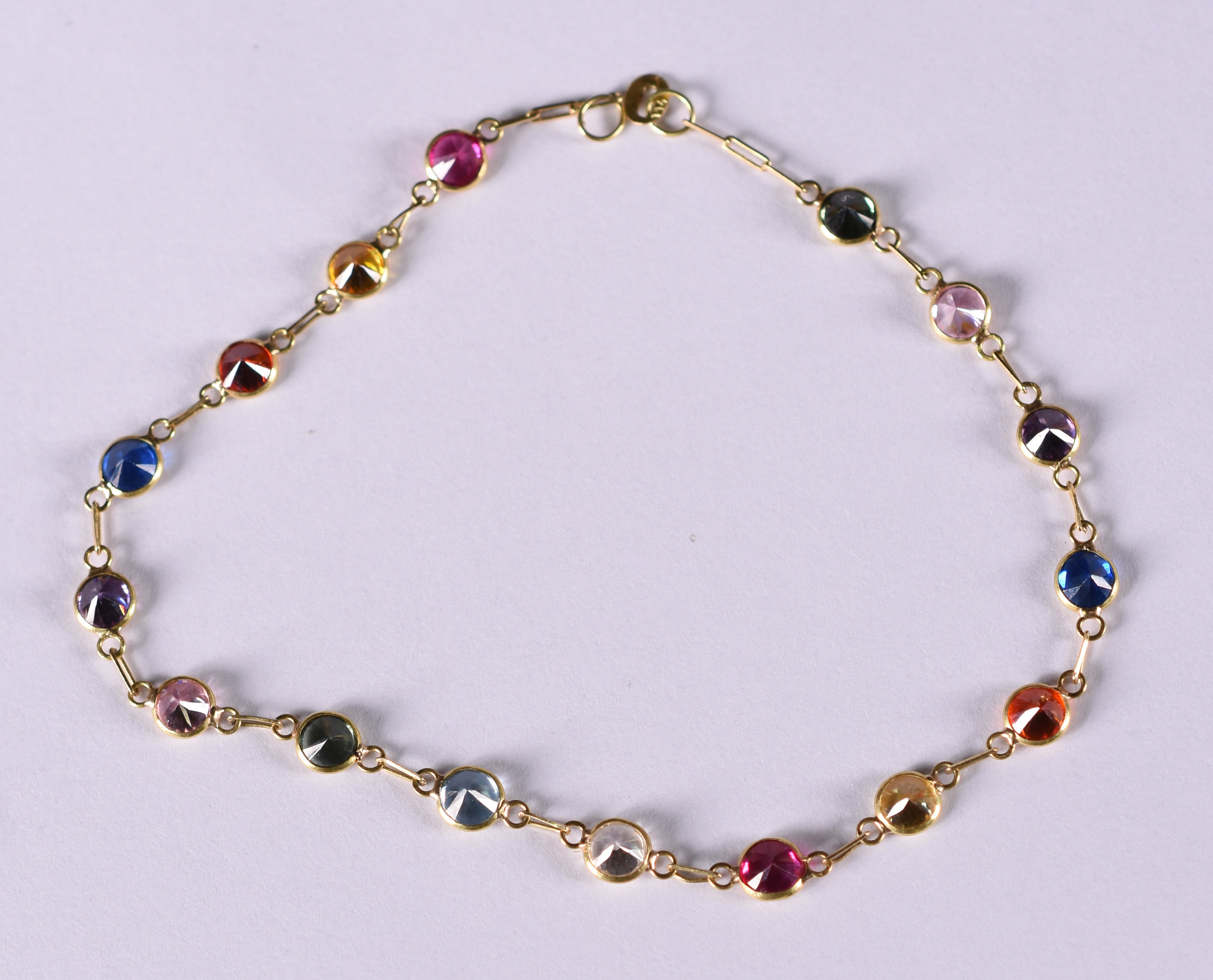 Pulseira de ouro amarelo com pedras coloridas ( Por questão de... - foto 1 de 3