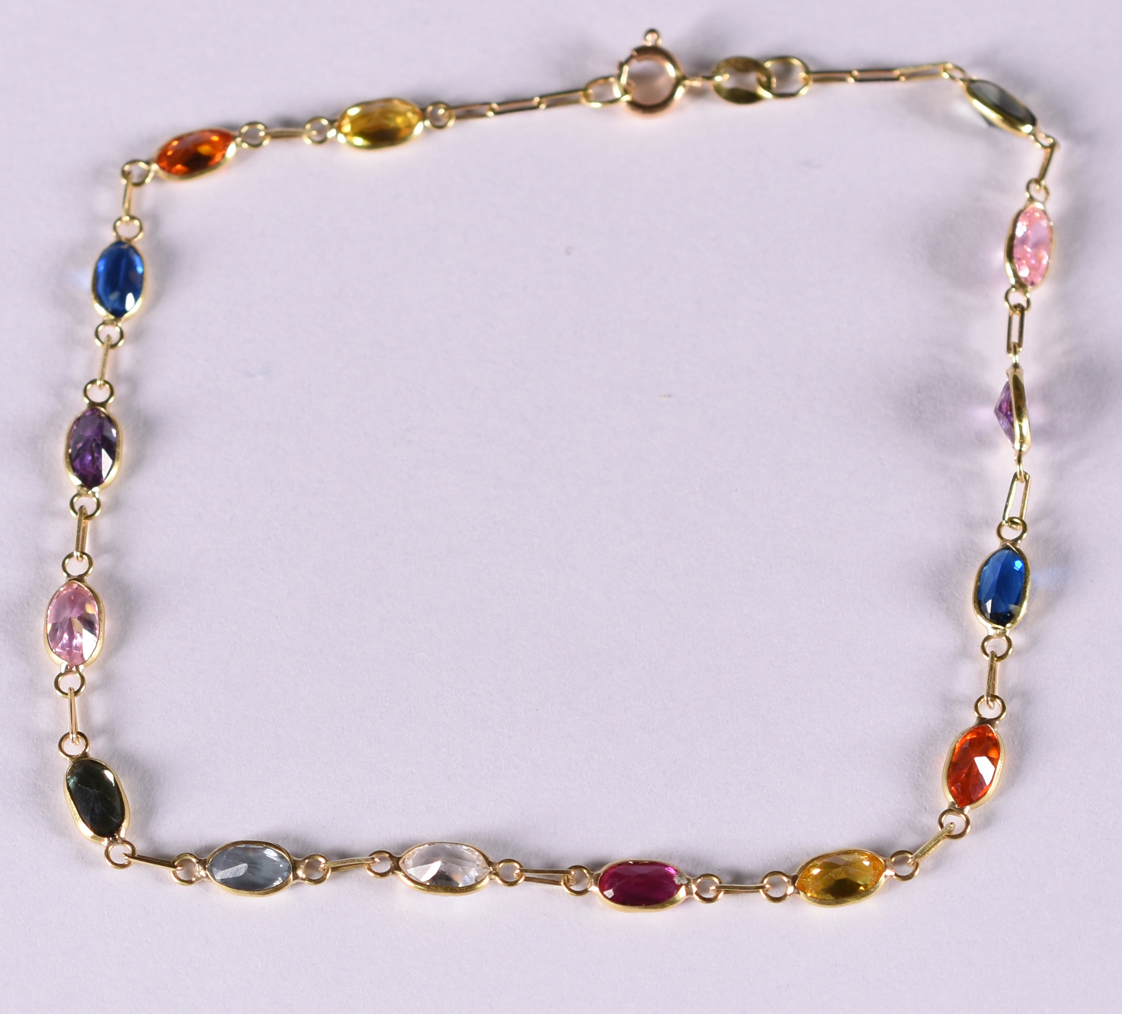 Pulseira de ouro amarelo com pedras coloridas ( Por questão de... - foto 1 de 2