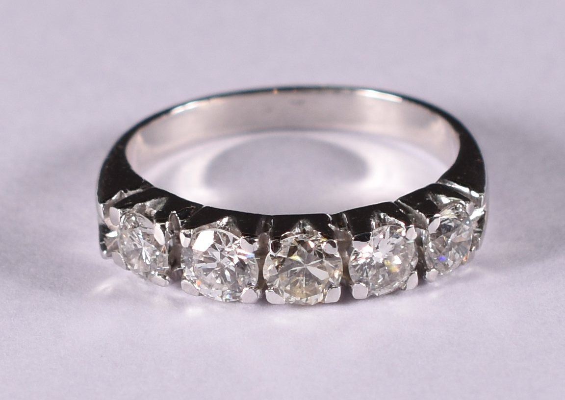 Anel de ouro branco com 5 brilhantes de 0.20 cada , total 1.0 ct. Aro... - foto 1 de 3