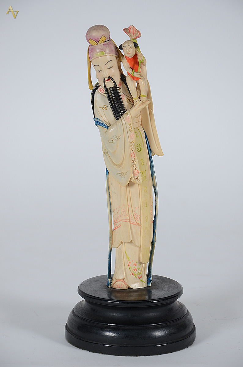 Estatueta de marfim policromada representando figuras orientais... - foto 1 de 2