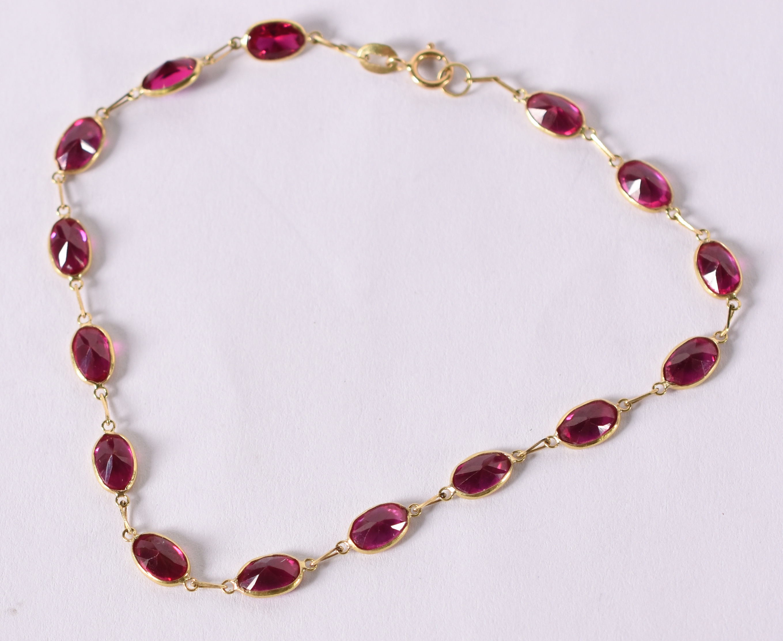 Pulseira de ouro amarelo com pedras rosas . 2,3 g ( Por questão de... - foto 1 de 2