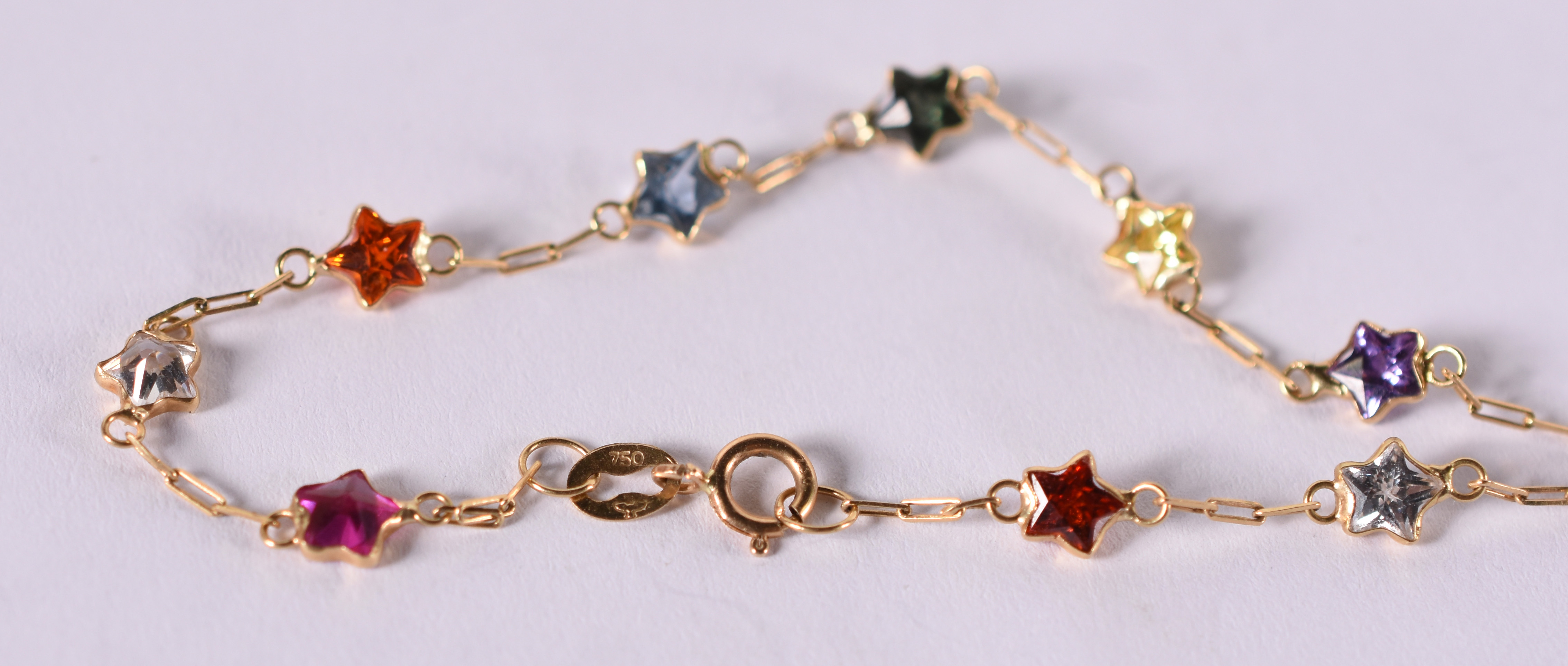 Pulseira de ouro amarelo com pedras coloridas . 1,5 g . ( Por questão... - foto 3 de 3