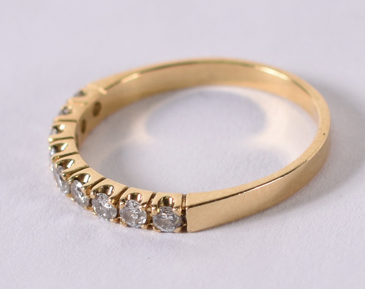 Meia aliança de ouro amarelo com 9 brilhantes . total 0,45 ct. Aro 16... - foto 2 de 3
