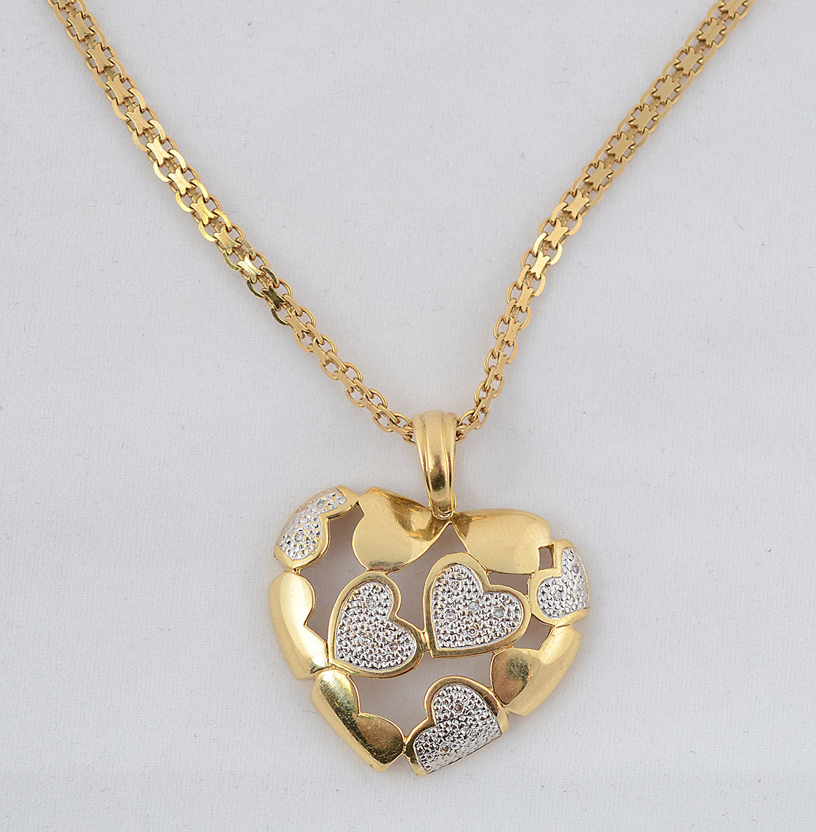 Gargantilha e pendente em forma de coração de ouro 18 k com... - foto 1 de 2
