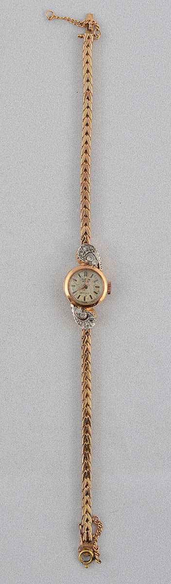 Antigo relógio feminino em ouro 18 k e brilhantes. Peso total 19,5 g... - foto 2 de 3