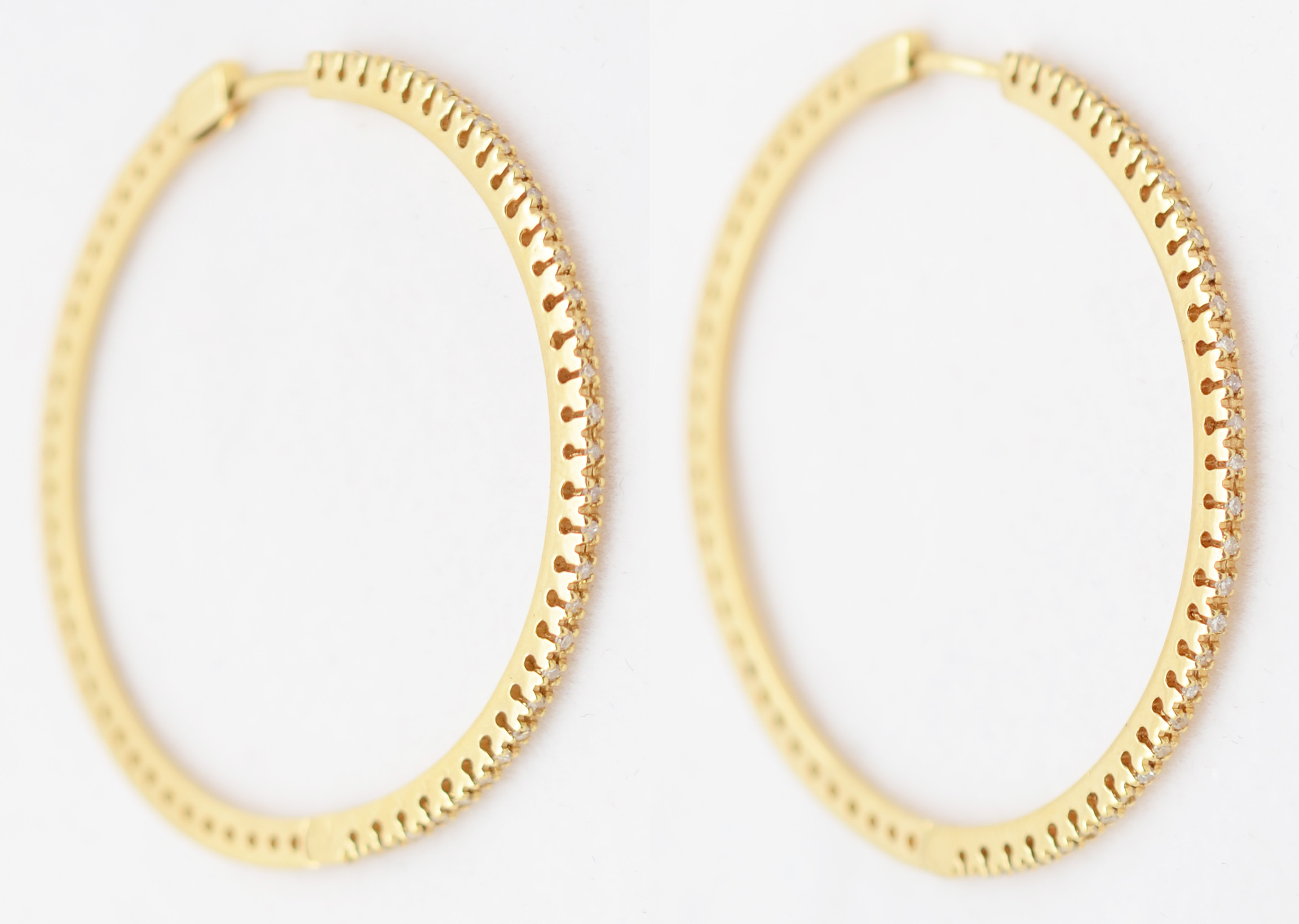 Par de brincos de ouro amarelo 18 k com 69 brilhantes modelo argola...